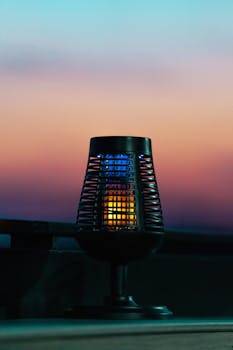 Solar light traps for insect monitoring and control
